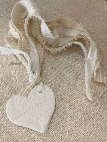 Handmade Unglazed White Clay Embossed Heart on Antique Hemp and Linen Tassel